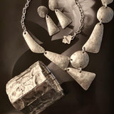 TOCADE Earrings