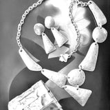 TOCADE Earrings